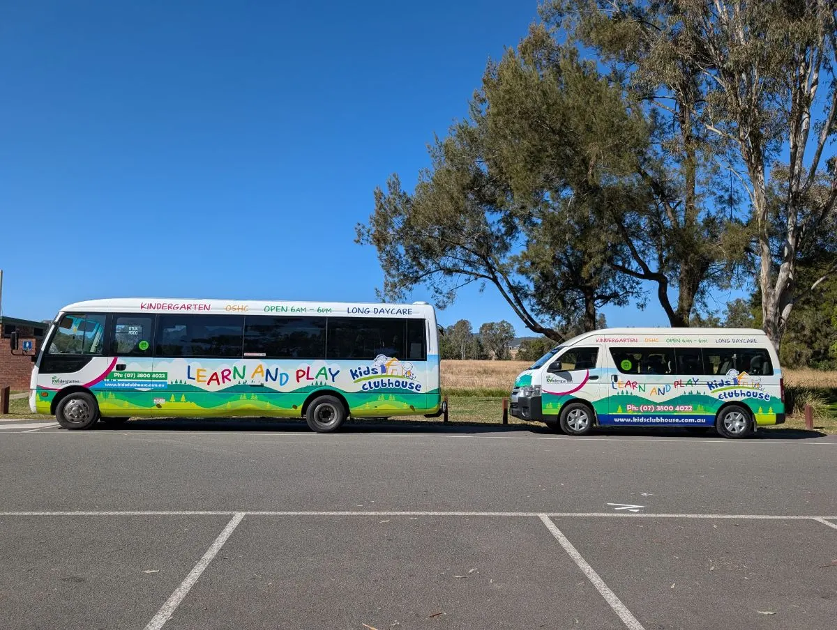Both buses parked side on at a local park